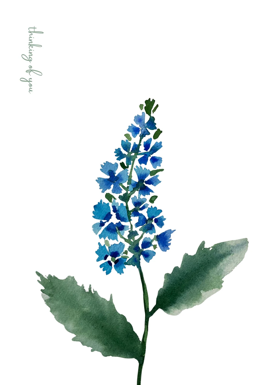 White card with a blue watercolour delphinium, two green leaves and the handwritten words thinking of you.